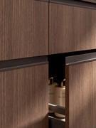 Detail of 'L' metal profile combined with 283 Cumin wood-effect melamine faced fronts