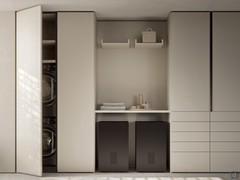 Wide laundry composition with drawers with pull-out ironing board, laundry baskets, washing machine and tumble dryer column, column with doors and drawers, back panel with shelves  