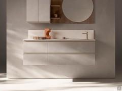 In this composition the washbasin base unit is flanked by a two-drawer base unit. Structure in Stone Effect Veneer 285 Mud. Stoneware top 3Z atalaia 