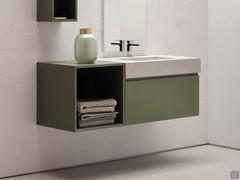 Atlantic matt lacquered open base unit on Reflex veneer, combined with a console vanity unit to create a small asymmetrical composition