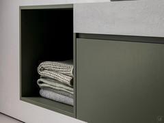 Detail of the Atlantic open base unit in matt lacquer on Reflex veneer