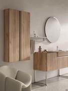 Suspended half-pedestal for Atlantic bathroom in wood veneer 278 Almond and opening with Palladium lacquered U-shaped metal profile, perfectly coordinated with the base units