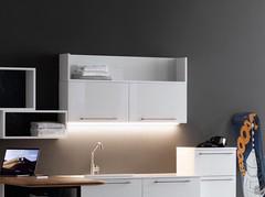 Pair of Oasis wall units with flip-up opening. With open elements from the same collection on top (LED bar not included)