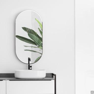 Raven oval bathroom mirror with frame and integrated LED lighting in the upper part of the frame