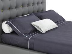 Satin pillowcases with contrasting ruffles and cordonet hemline