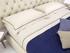 Elegant bed set in Percale finished with blue cord that picks up the colour of the quilted mid-season checked quilt