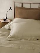 Satin bedlinen set here with precious hemstitching on top sheet and pillowcases with ruffles