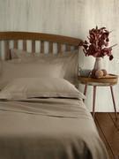 Fresh bed linen in pure linen, here proposed in dove grey but available in many variations