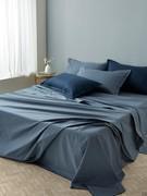 Sheet set in Stormy Percale with additional pillowcases in Blue Depths