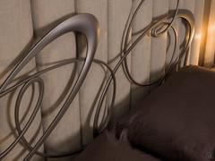 Headboard detail with artistic design 