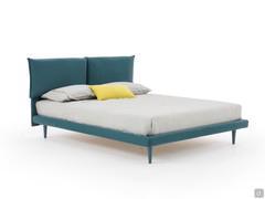 Sofy bed with slim bed frame and tall feet