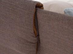 Detail of the cushions covering the headboard of Ambra bed