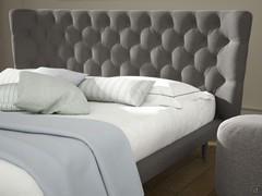 Detail of the tufted haedboard and the slim bed frame