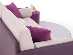 Detail of the sofa rear with backrest cushions and roll pillows (Birba accessories)