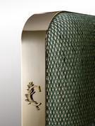 Smooth headboard with rounded corners and bronze metal frame with Cantori branding