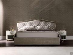 Valentino bed with velvet quilted headboard by Cantori