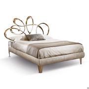 Dolcevita bed with wrought iron swirls by Cantori