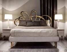 Dolcevita golden metal bed by Cantori with upholstered bed frame