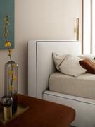 Padded headboard with contrasting profile