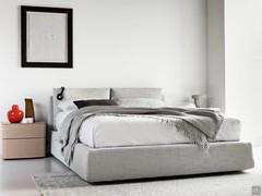 Upholstered bed with double headboard Bayport covered in gray fabric