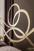 Detail of J'Adore headboard swirls in a classy champagne silver leaf finish