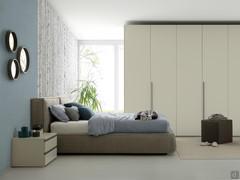 Side view of Nuvola soft upholstered bed