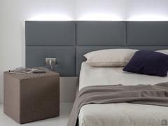 Composition boiserie panels use headboard with lights and electrical outlet