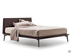 Wooden bed with high feet Lacrosse in the version with wooden headboard and bed frame