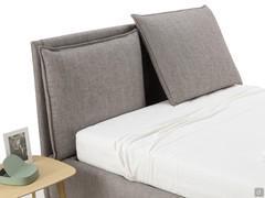 Blend bed with reading cushioned headboard that can be lifted on the mattress 