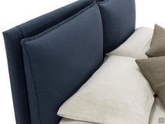 Detail of the headboard with cushions to rest on