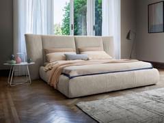 Double bed with soft headboard Youniverse by Bonaldo, with side wings upholstered in fabric, leatherette or leather