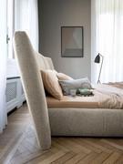 Double bed with soft headboard Youniverse by Bonaldo with high headboard and upholstered bed frame to match