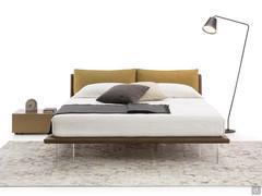 Gibli double bed with its characteristic "floating" effect thanks to its transparent methacrylate feet