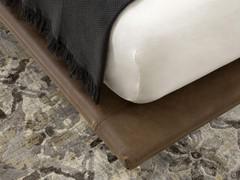 Detail of the thin bed-frame in Tivano leather