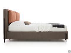 Side view of the Nemi bed with external legs on the bed frame