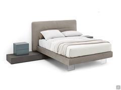 Tennessee upholstered bed with legs made from methacrylate