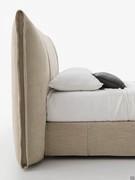 Bed with upholstered headboard and vertical stitching Jim, 118 cm high