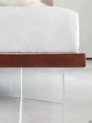 Detail of the extra-slim bed-frame h.5 cm with transparent methacrylate feet for a "floating" effect