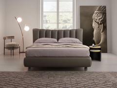 Amanda upholstered bed with low, elegant headboard