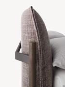 Detail of the headboard cushions featuring a raised edge