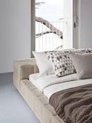 Detail of the bed Squaring by Bonaldo, which can be upholstered in fabric, leatherette or leather 