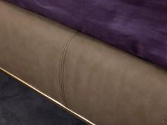 Leatherette upholstered bedstead, matching the bronze metal base