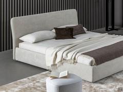 Upholstered textile bed Tonight by Bonaldo with a smooth headboard and high bed frame, one of several variations available at configurator