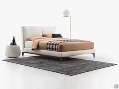 Bed with upholstered headboard and high painted metal feet, available in different models