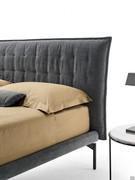 Details of the Felipe bed with a super slim 5 cm high bed frame, and high tubular metal feet (mod. T)