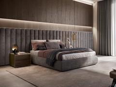 Bed Lounge with low headboard expanded to cover the entire wall in width. The compositions with slats are expandable in width in the dedicated section of the Configurator