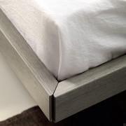 Detail of the 45° cut on the bed-frame sides (finish not available)