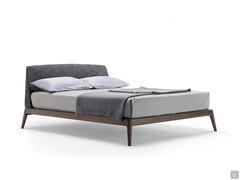 Bed Bastian with slim wooden bed frame with matching feet