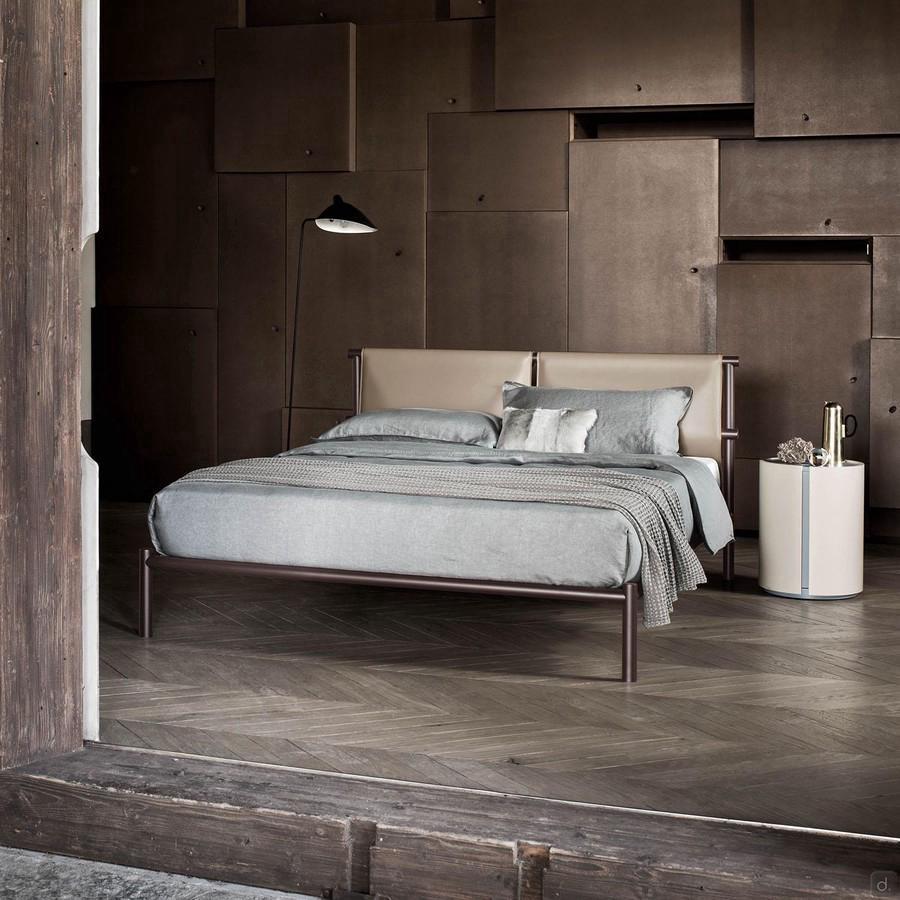 Skinny minimalist bed with hide leather headboard