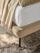 Detail of the thin bed frame h.10 cm with raised rib on the fabric cover